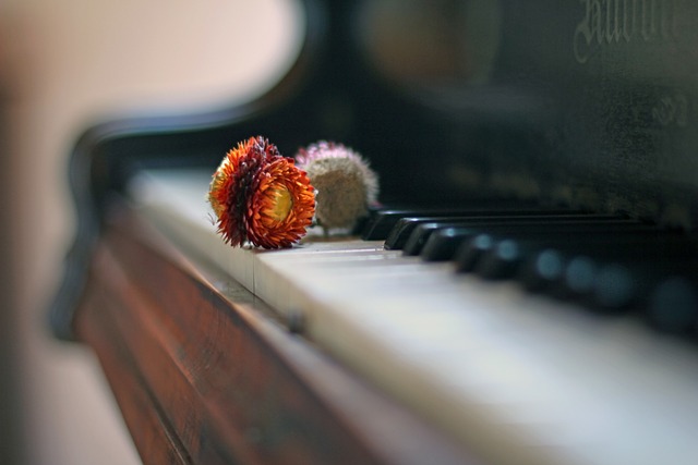 piano with flowers on