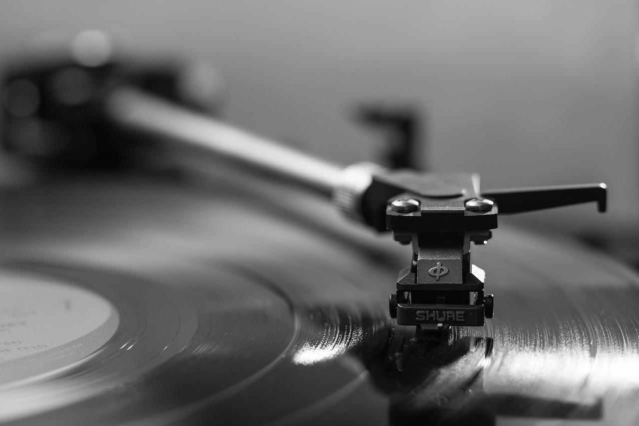 A Shiny Vinyl Record Photographed in Black and White