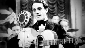 al bowlly artist photo singing into a 1940s mic